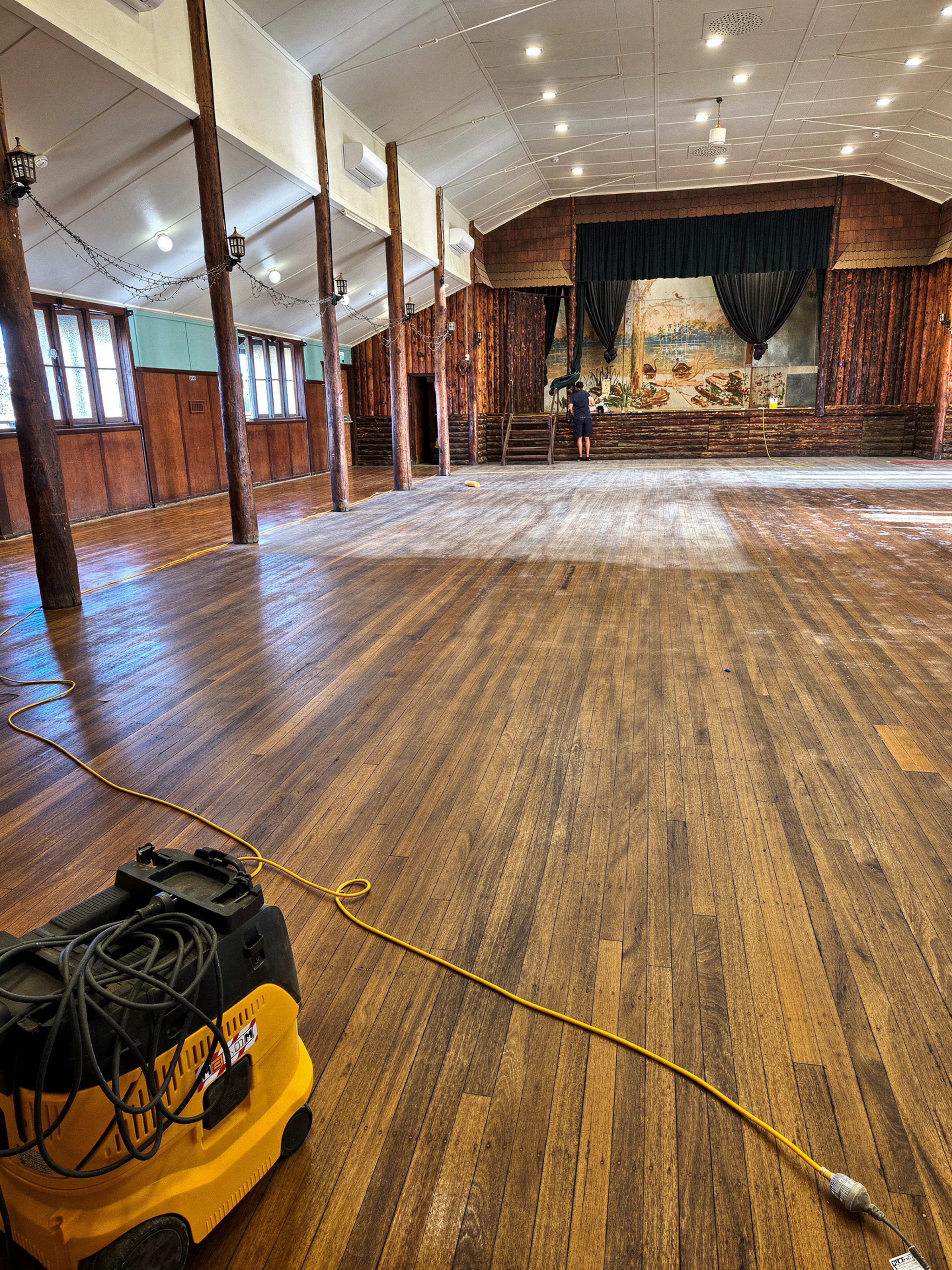 Wide view of restored Cypress Pine dance floor