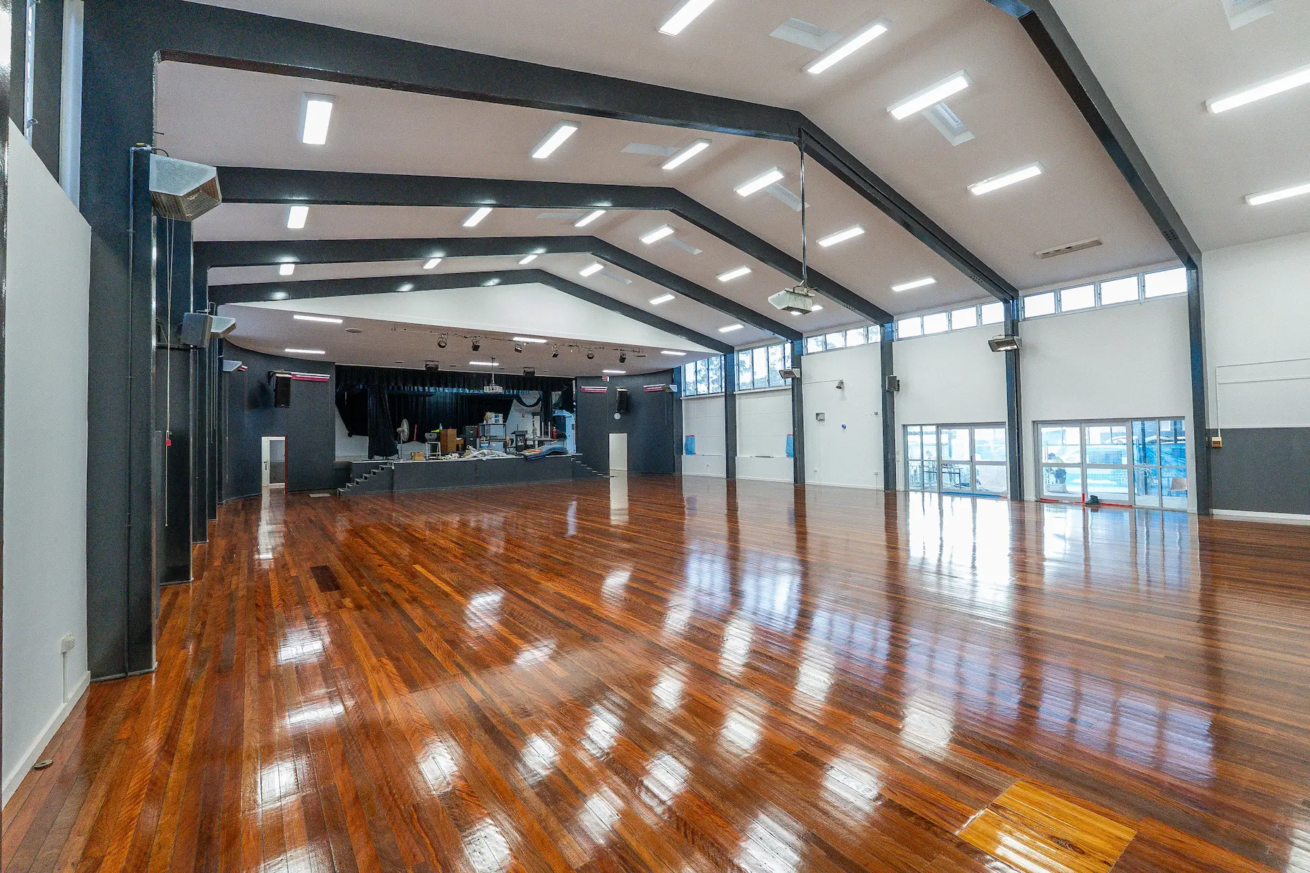 Close view of rich reddish-brown timber boards after professional finishing, Sydney